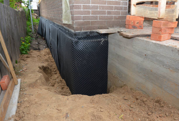 Happy homeowners after waterproofing job in Springwater